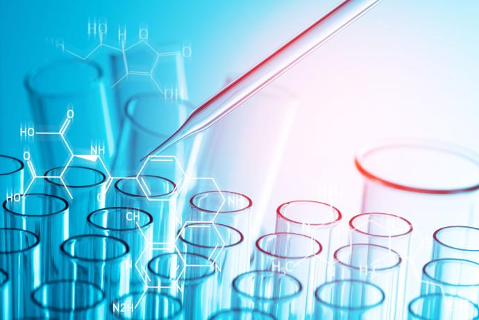 stylized image of test tubes with pipette on blue background 