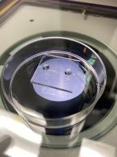 Decorative image showing microfluidic device 