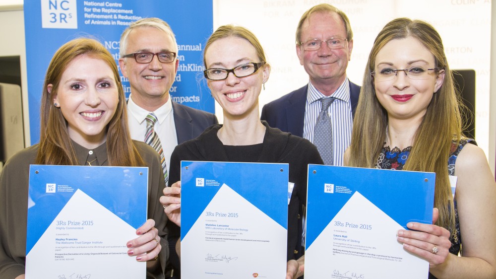 The two winners, and one highly commended winner of the 2016 3Rs prize. Left to right: Dr Hayley Francies (highly commended), Dr Madeline Lancaster (winner) and Laura Hall (winner). Behind them is a representative from GSK who gave the awards at the prize ceremony and the NC3Rs board chair at the time Stephen Holgate. 