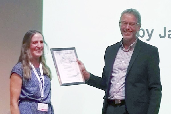 Dr van der Valk being awarded the Björn Ekwall Memorial Award