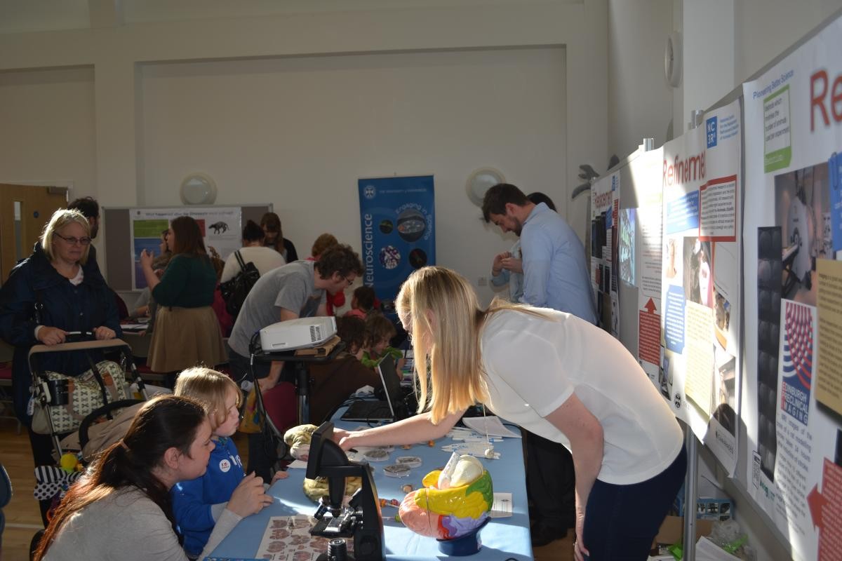 The NC3Rs exhibition stand with attendees by the stand