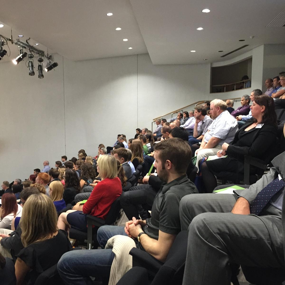 An audience listening to the talks