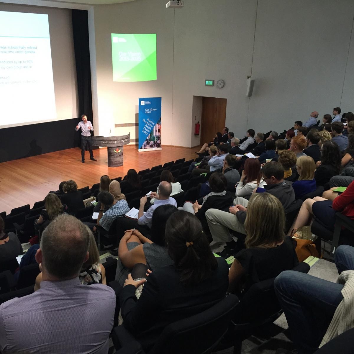 An audience listening to the talks