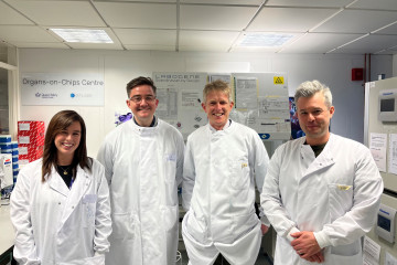 Photograph of Professor Martin Knight's lab group, from left to right, Dr Joanne Nolan (Centre Scientist, QM+Emulate Organs-on-Chips Centre), Dr Timothy Hopkins (named researcher), Prof. Martin Knight (PI), Dr Angus Wann (Co-I).